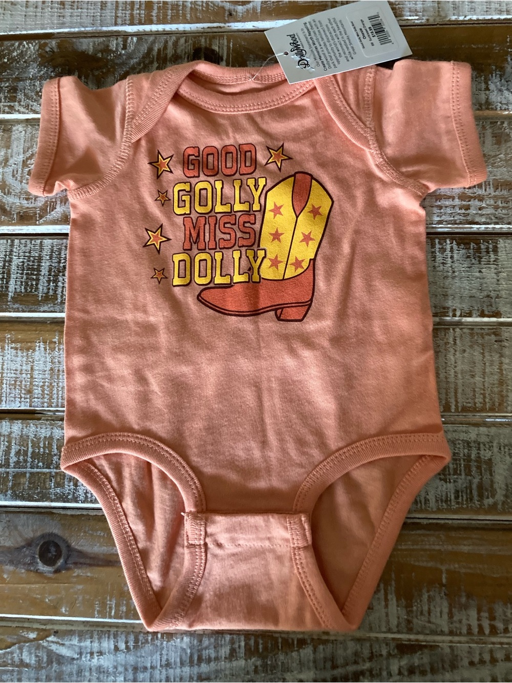 Good Golly Miss Dolly Peach Graphic Baby Bodysuit